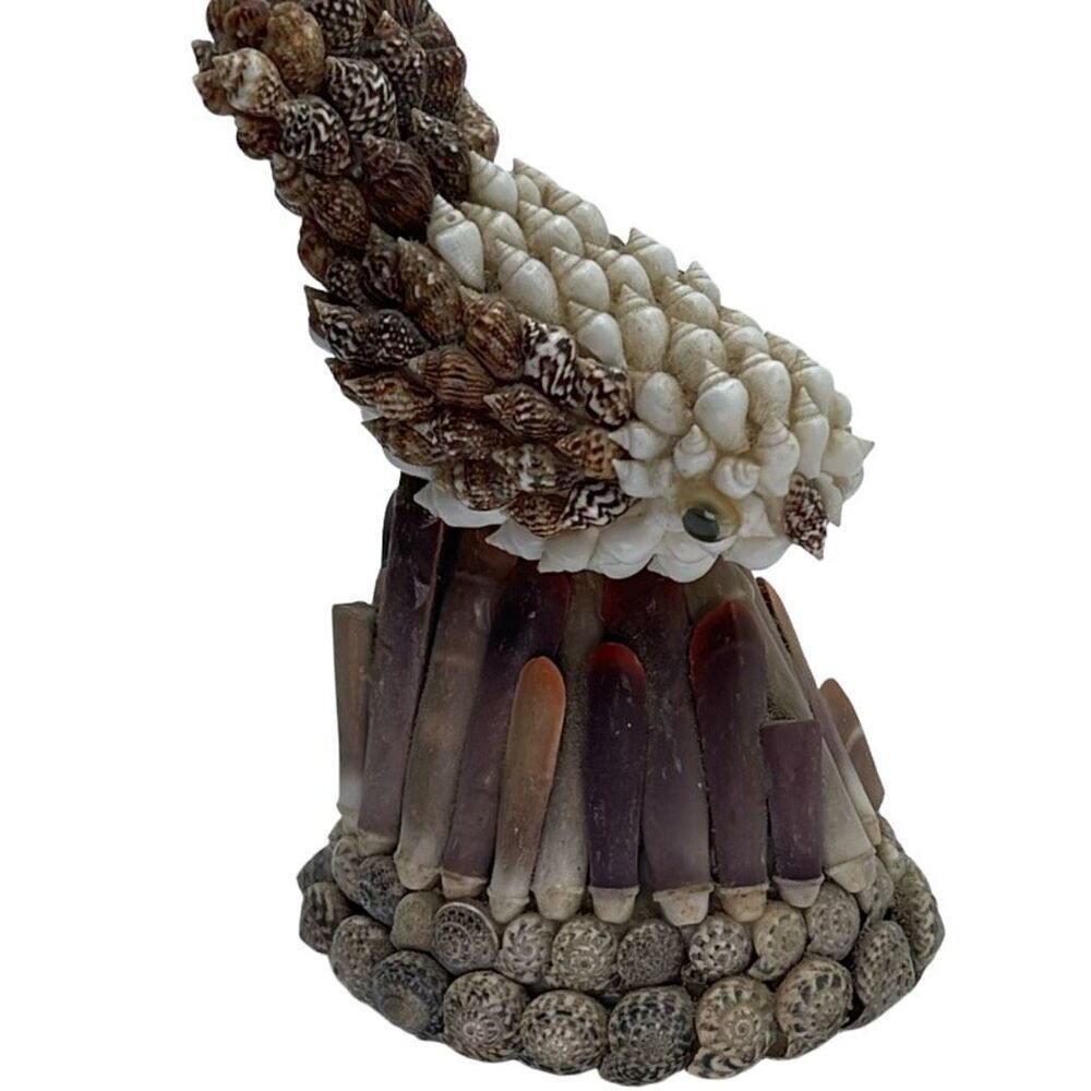 Vintage 80’s Philippines-made seashell folk art perched bird.
